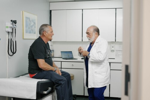 Downtown-Omar-with-patient.jpg